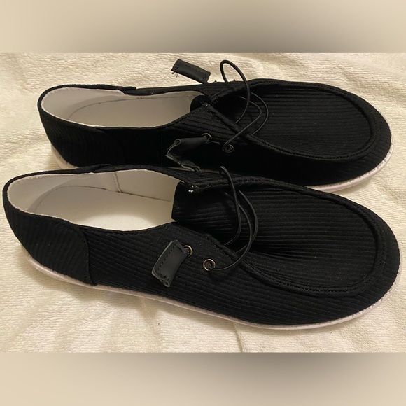 Black Canvas Slip-On Shoes - Picture 1 of 9